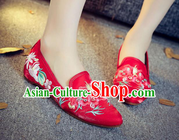 red embroidered shoes