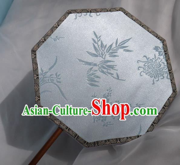 China Classical Plum Orchids Bamboo Chrysanthemum Pattern Palace Fan Traditional Hanfu Fan Handmade Blue Silk Octagon Fan