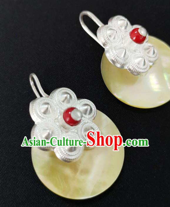 China Traditional Yi Nationality Silver Ear Accessories Handmade Liangshan Ethnic Yellow Shell Earrings