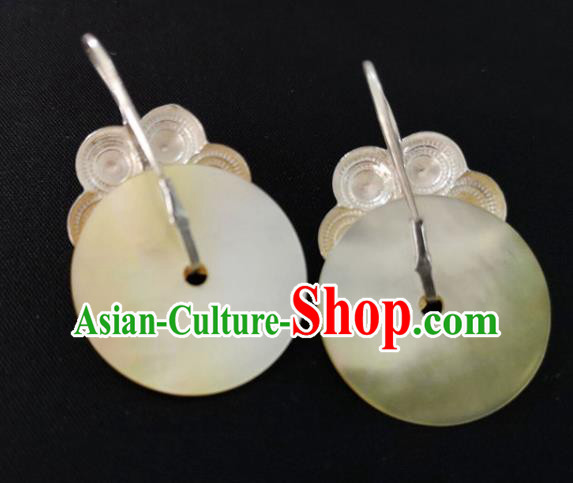 China Traditional Yi Nationality Silver Ear Accessories Handmade Liangshan Ethnic Yellow Shell Earrings