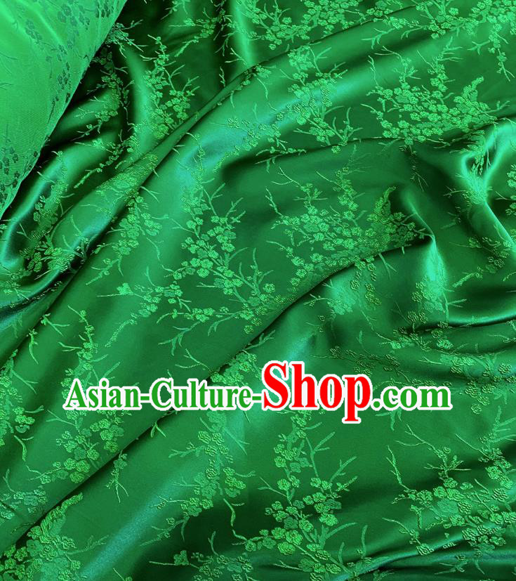 Green China Classical Embossed Plum Blossom Pattern Silk Cheongsam Stretch Fabric Traditional Material